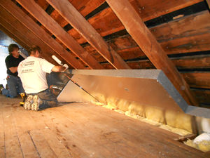 Insulating and sealing an attic with our attic insulation system